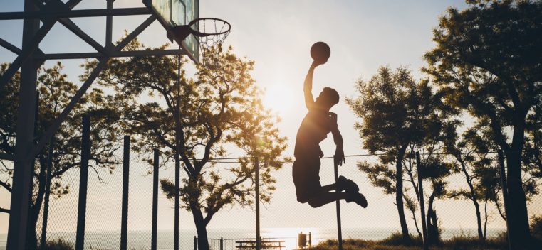 black-man-doing-sports-playing-basketball-sunrise-jumping-silhouette (2)